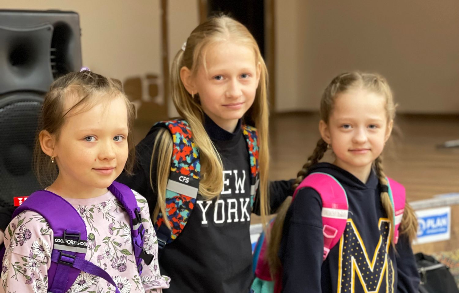 Ukrainian girls with their new backpacks